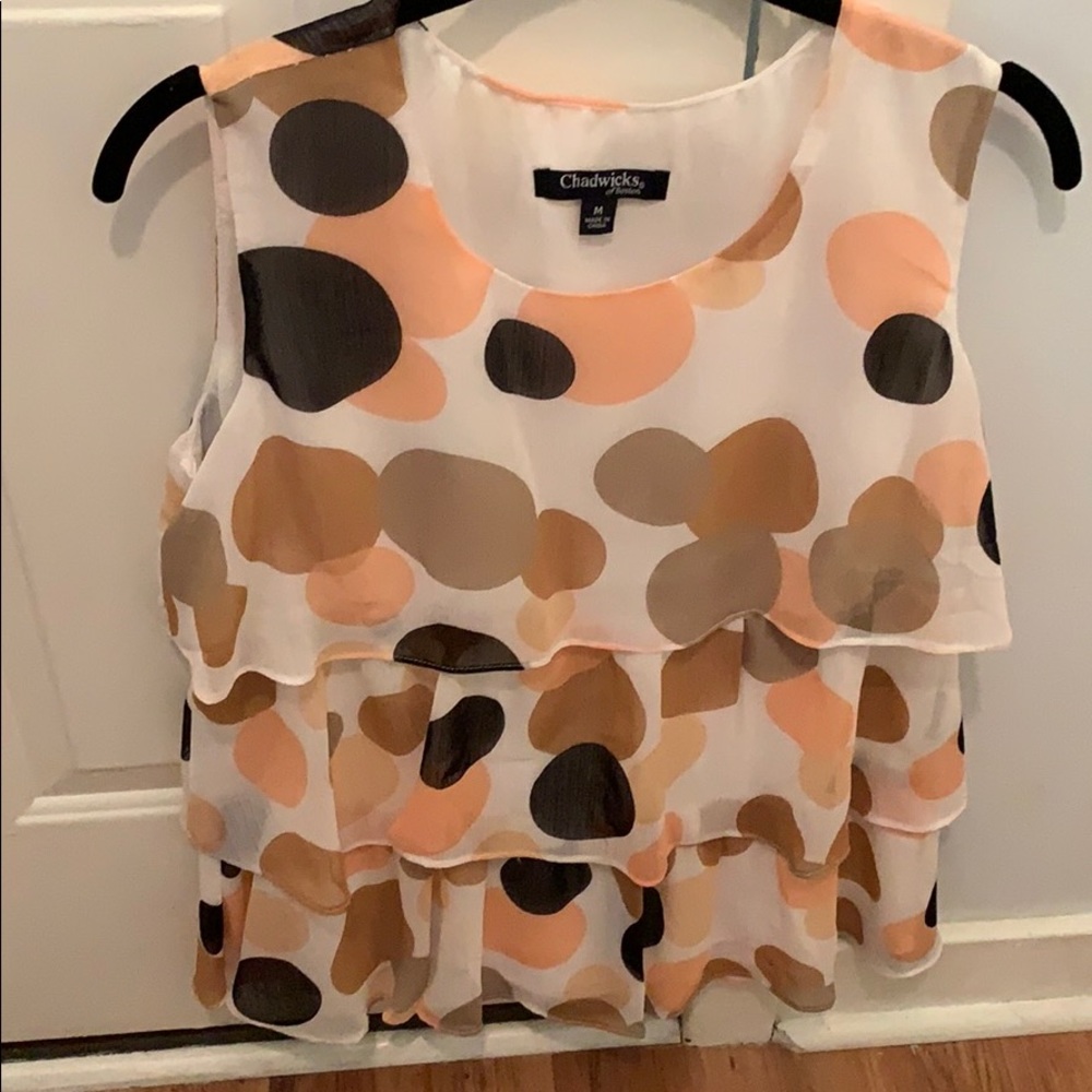 Layered polka dot sleeveless blouse